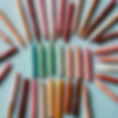 A selection of various lip balm pencils arranged artistically.