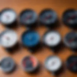 Different types of bicycle speedometers displayed on a table