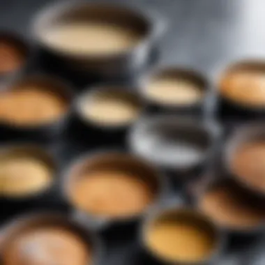 Different sizes of round removable baking pans arranged neatly.