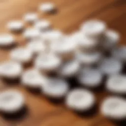 Cotton discs arranged aesthetically on a wooden surface.