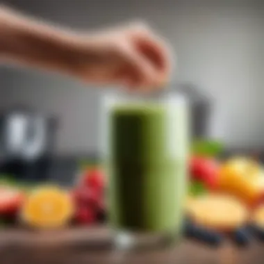 A close-up of a hand holding a freshly prepared smoothie with a straw.