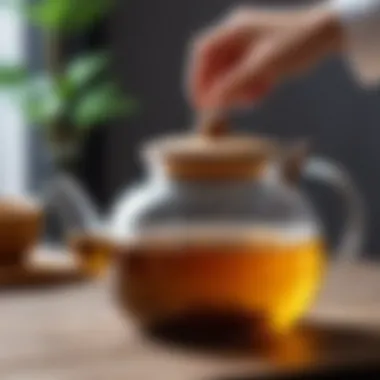 Elegant glass teapot showcasing its wooden lid