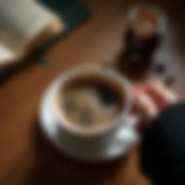 A person enjoying Jacobs Monarch coffee while reading a book