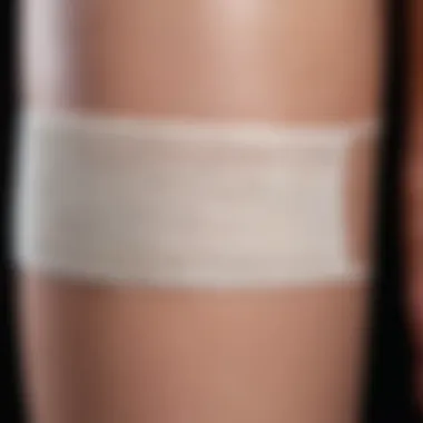 Close-up of a square bandage on a skin surface