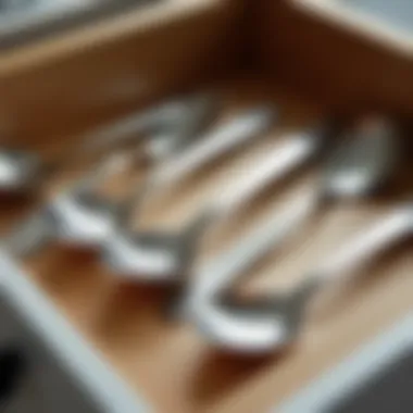 Stainless steel ladle displayed in an organized kitchen drawer