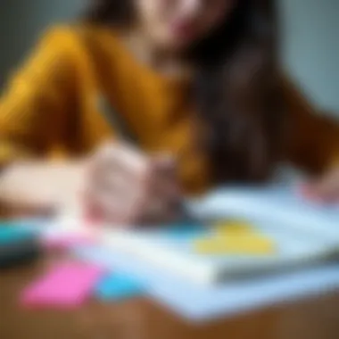 Student using sticky bookmarks for study