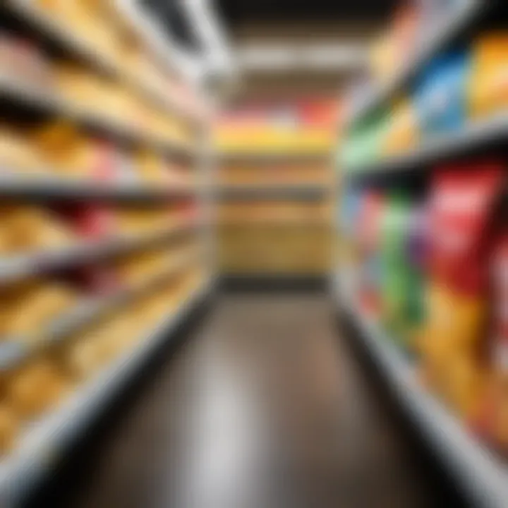 A consumer comparing prices of large bags of chips on a grocery store shelf.