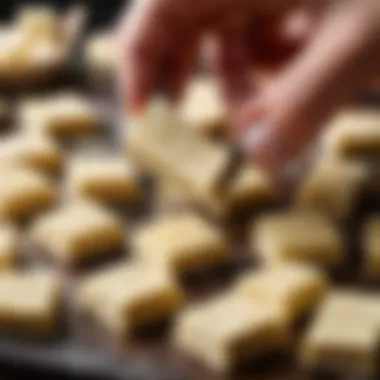 Close-up of white chocolate toffee being cut into pieces